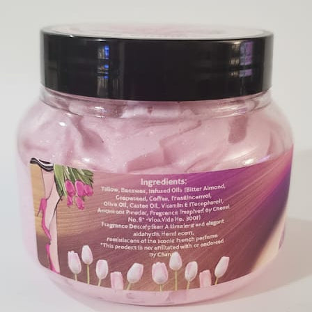 Whipped body butter in an open jar showing creamy texture, natural moisturizer for soft and smooth skin